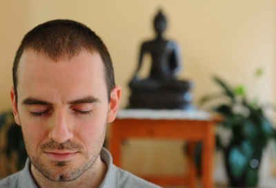 Photo of someone meditating.
